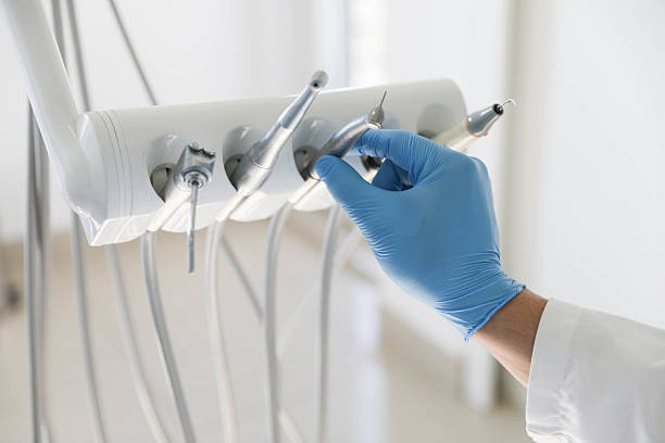 Professional Tooth Extraction technician working in Auburn, KS